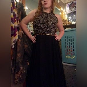 Black backless dress with fancy top floor length